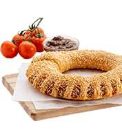 Traditional bagel with tomato and olive