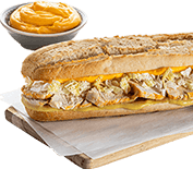 White baguette with chicken and cheddar cheese