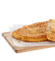 Pie with cheese, honey and sesame seeds