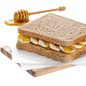 Wholemeal toast with peanut butter, banana and honey