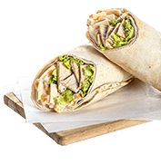 Tortilla with chicken fillet, cheese, vegetables and mayonnaise