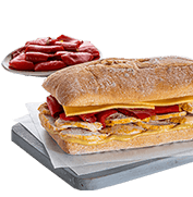 Cheese bread with chicken fillet, cheddar, red peppers and mustard-honey sauce